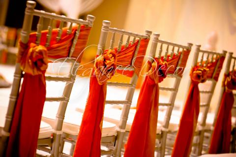 Chiavari chairs with Rose Bow- Decor For an Indian Wedding By Elegance Decor 847-791-0397 contact@elegance-decor.com- Serving the Midwest (Chicago, Iowa, Michigan, Ohio, Indiana)